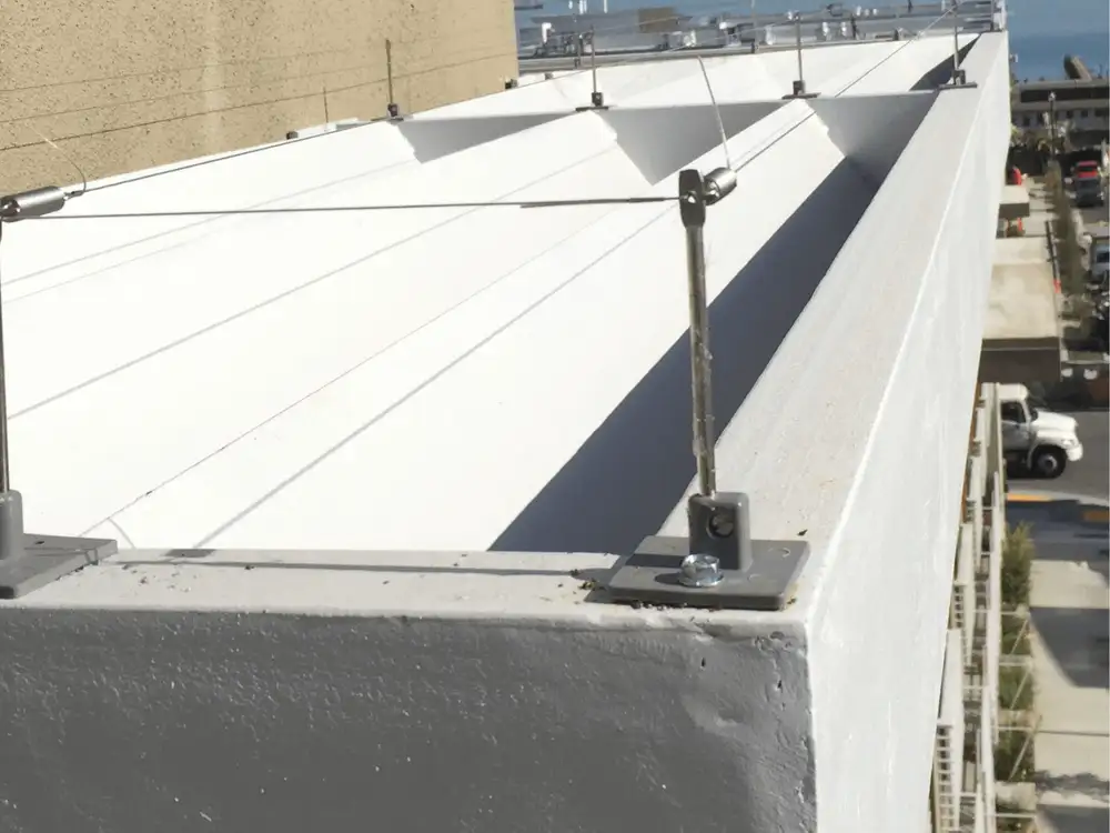 Bird-Wire® spring-tensioned post and wire system on a facade