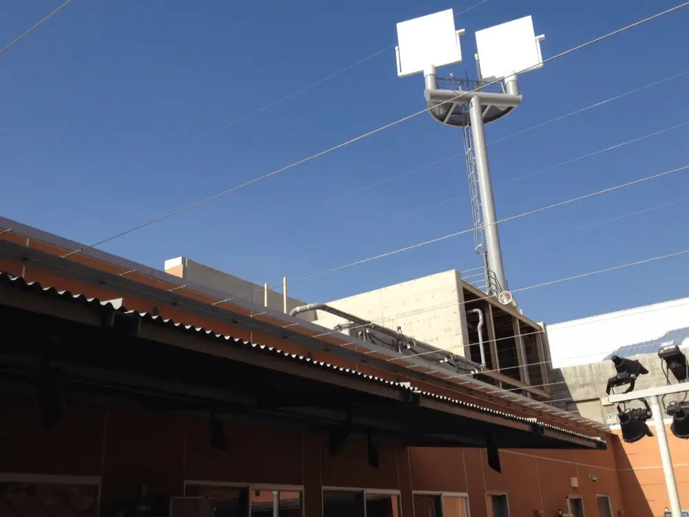 Gridwire suspended over an open-air parking lot