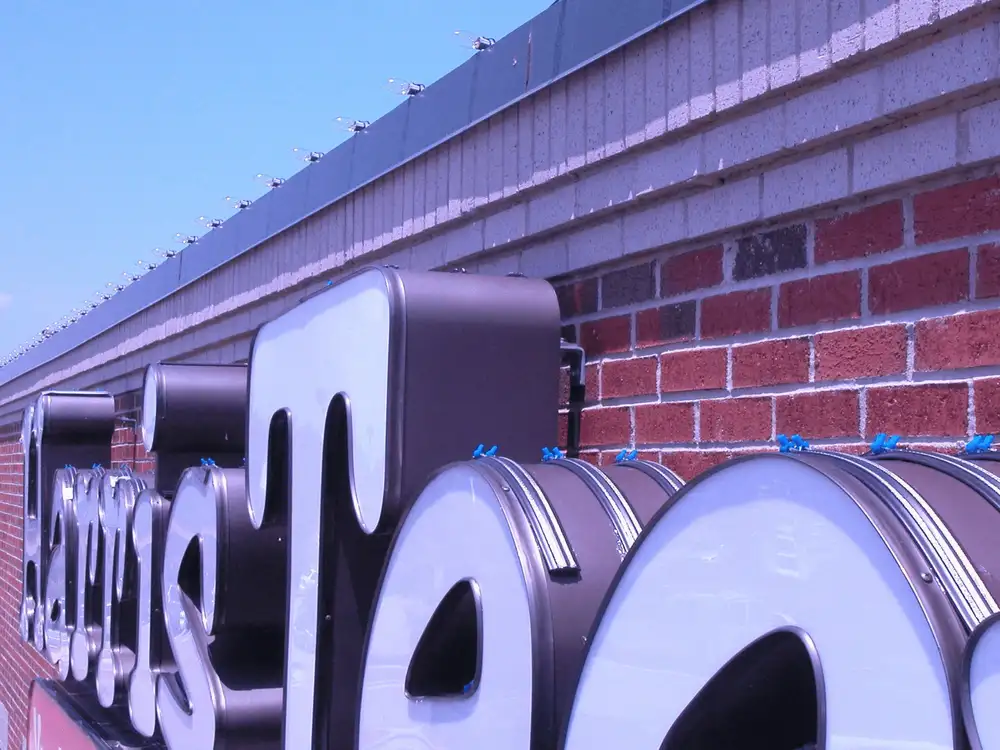 Bird-Shock® electric track fitted to signage