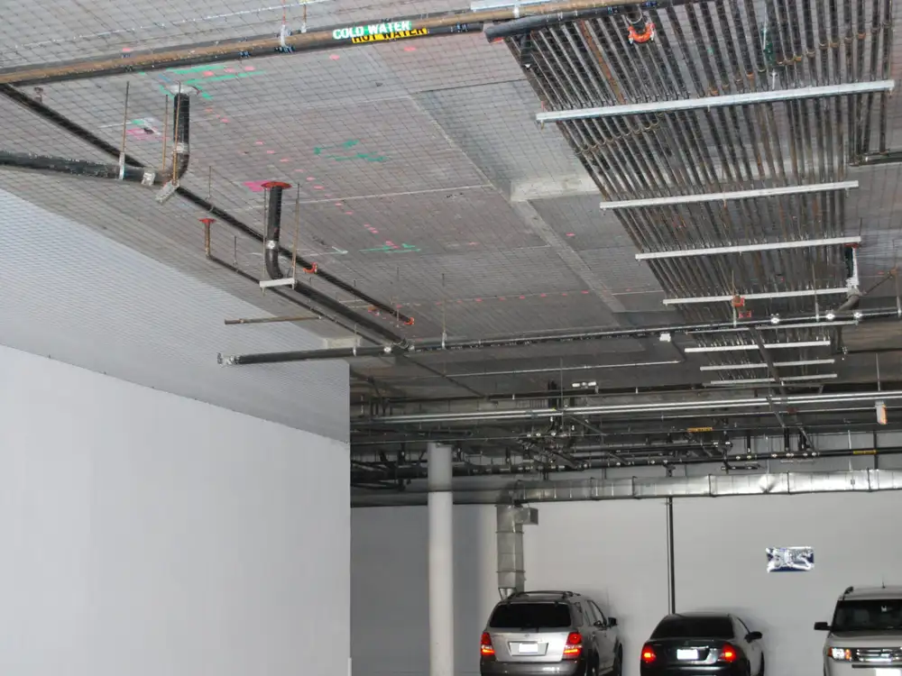 StealthNet netting enclosing a parking structure opening