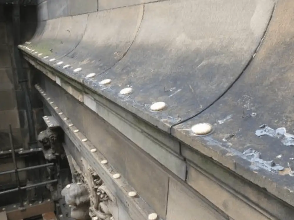 Optical Gel dishes on an ornate facade ledge