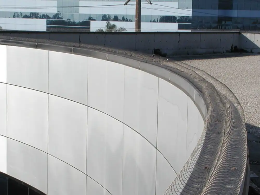 Bird-Coil stainless coil on a parapet